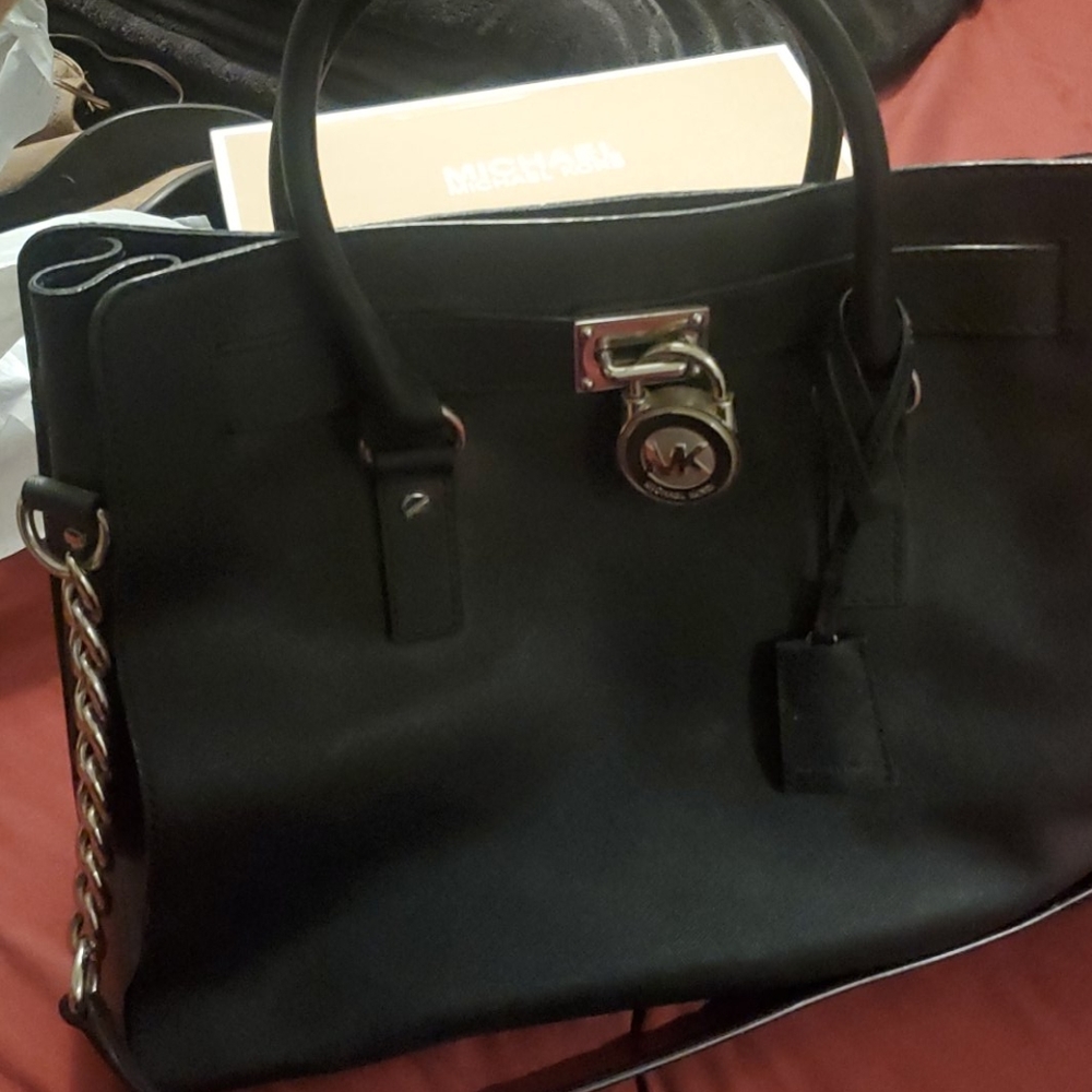 Black and silver Michael Kors hand bag